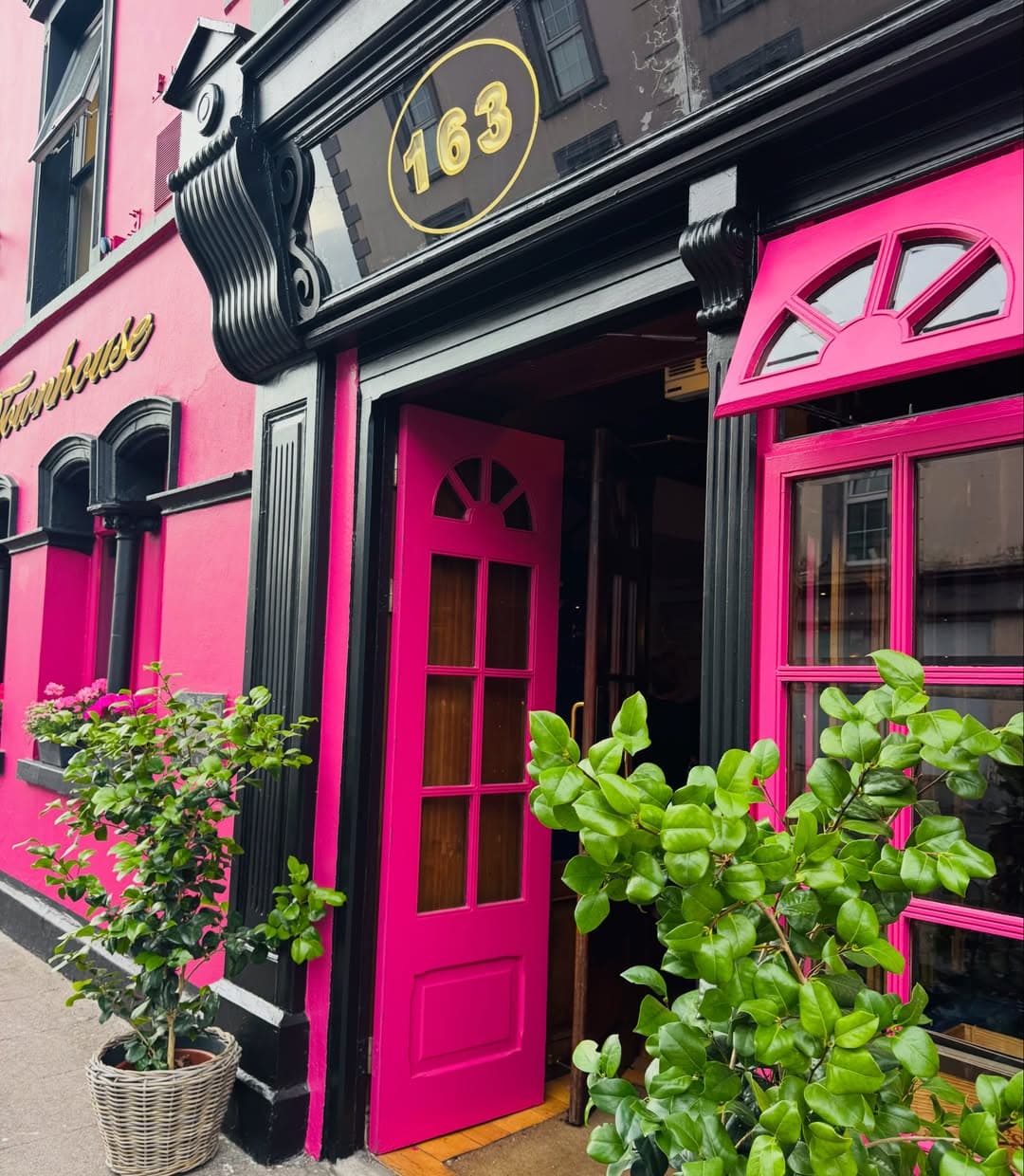 The vivid pink and black entrance to Aherne’s